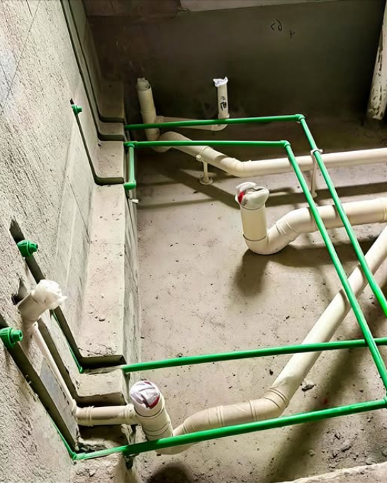 Concealed UPVC anti-termite pipeline network installed along foundation walls before flooring